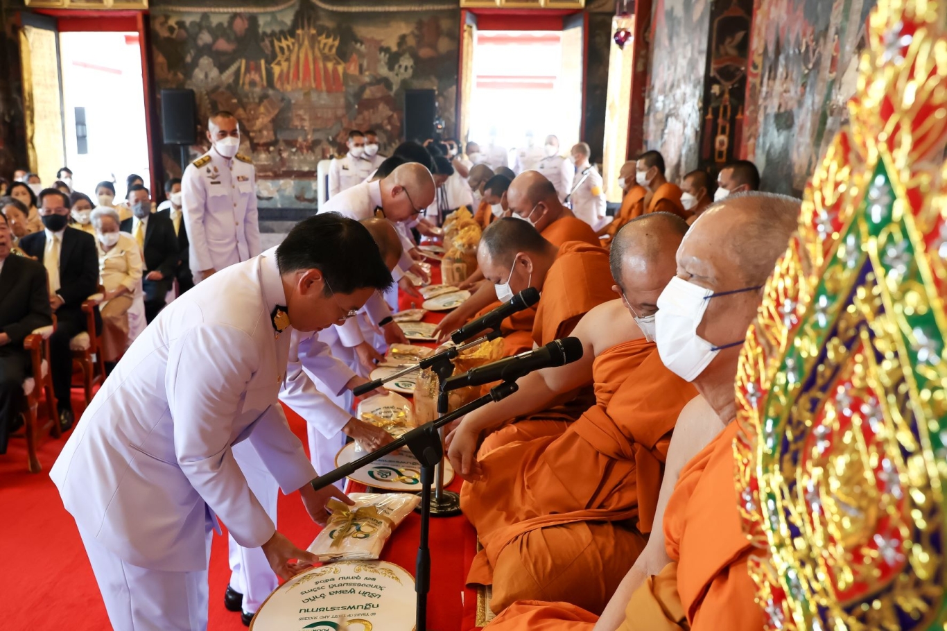 Poonphol Donation to Support Monk Robe 1.jpg